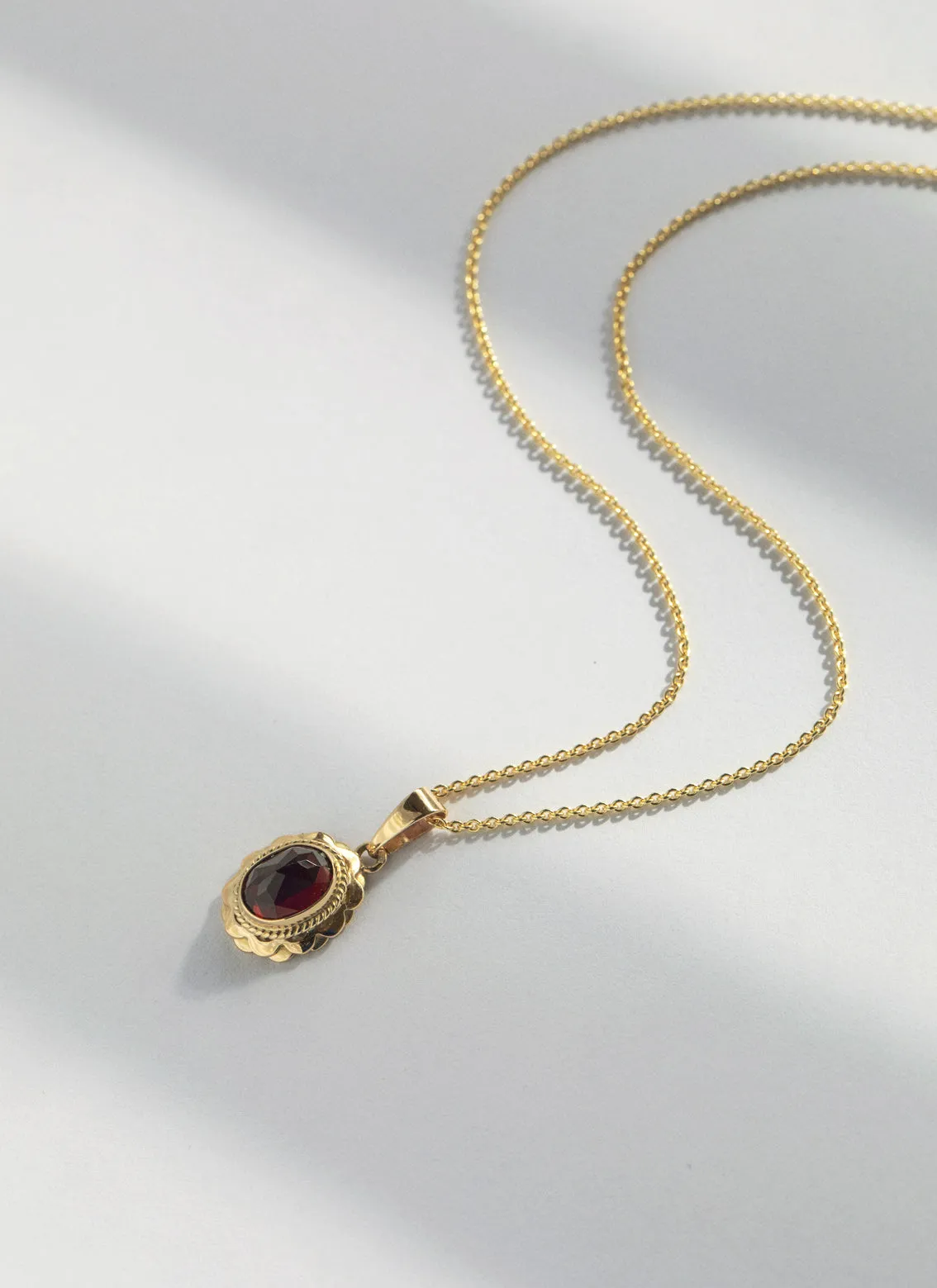 Ana garnet charm 14k gold